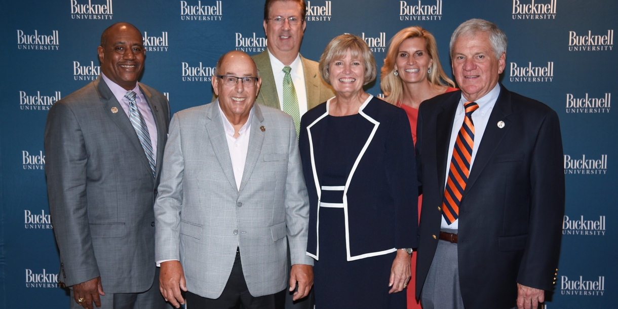 Alumni posed with President Bravman
