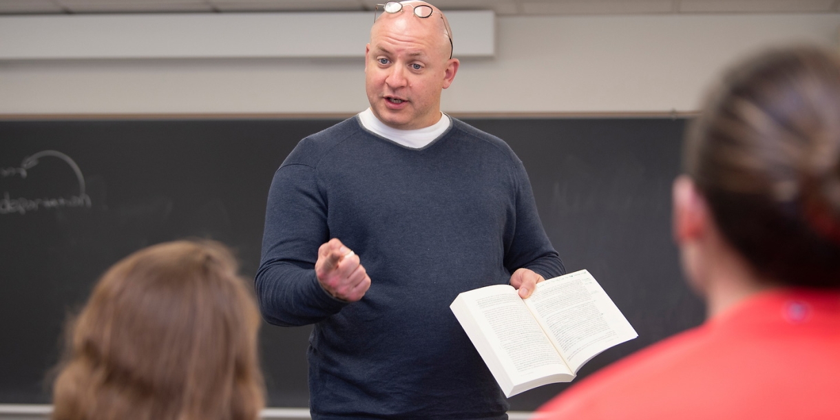 Professor teaching history class