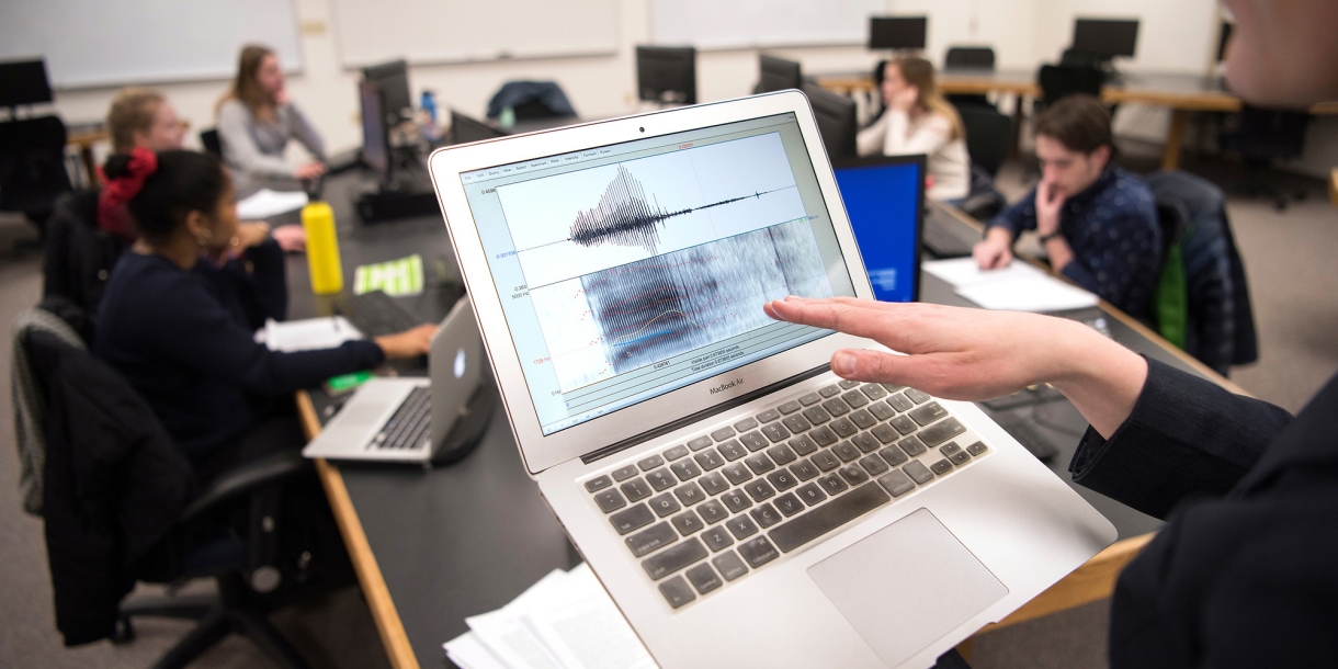 Students review a linguistics waveform