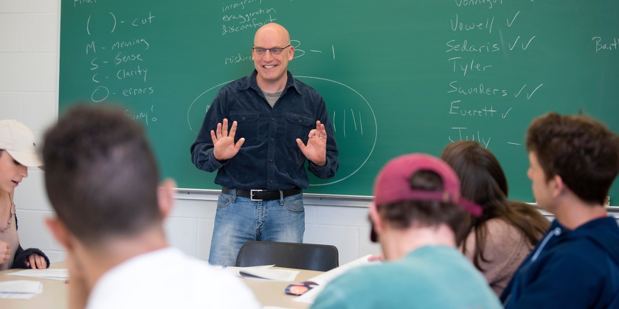 Professor Rosenburg teaches English to a class