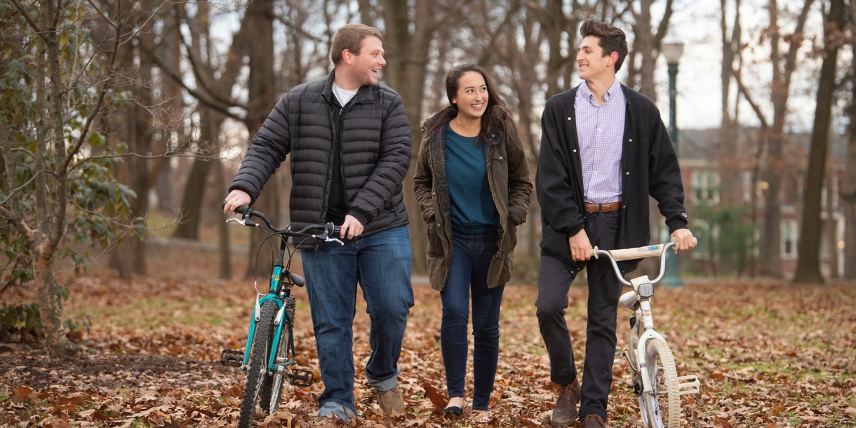 Students with bicycles in The Grove