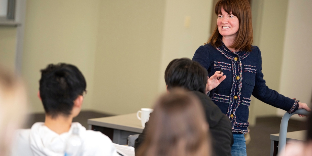 Professor Elizabeth Durden teaching class