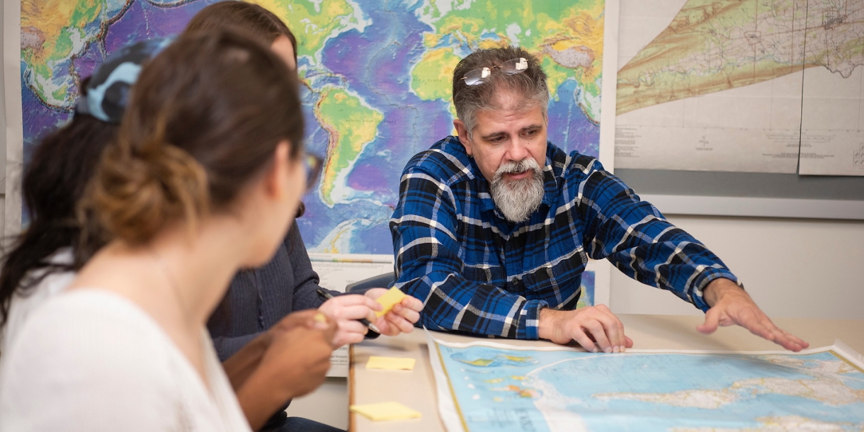 Faculty and students in geography class