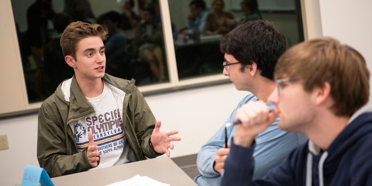 Student leads a group discussion in class