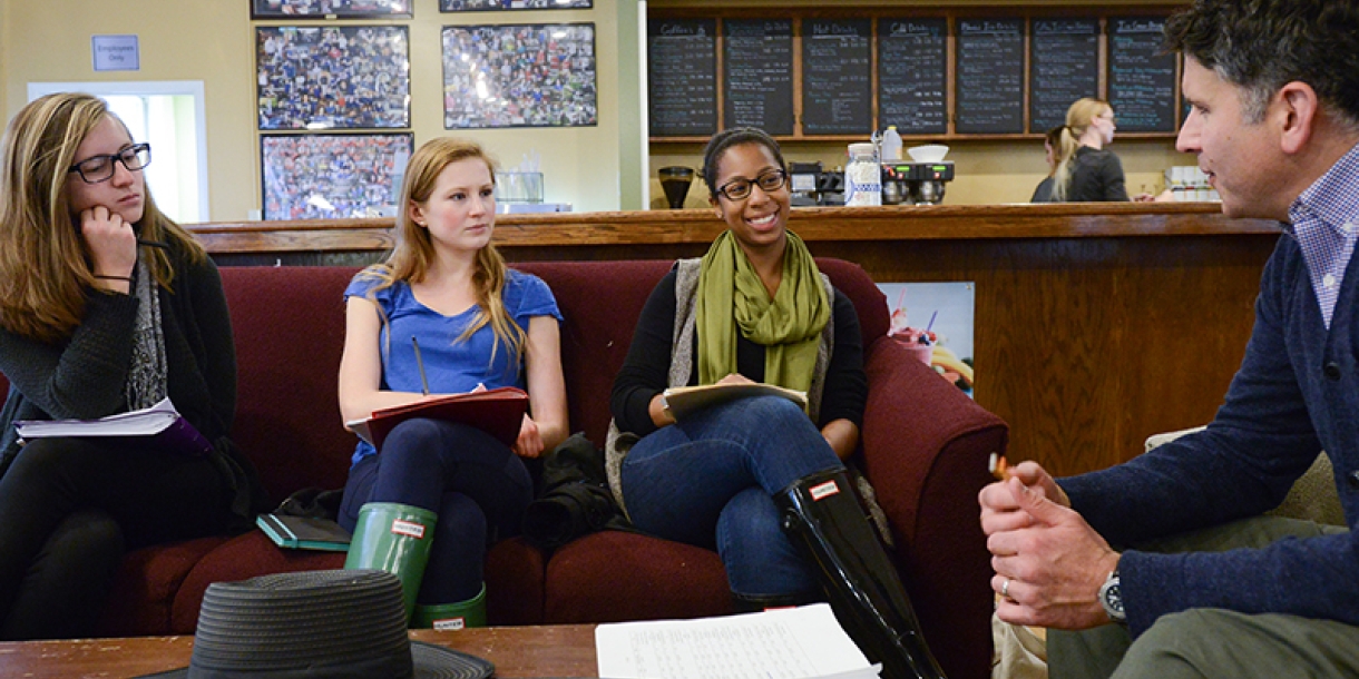 Students reviewing manuscripts