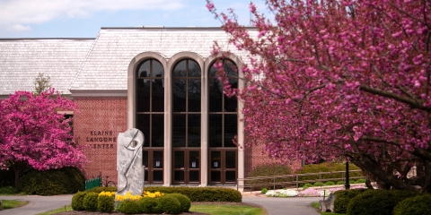 Exterior of the ELC with cherry blossoms in bloom