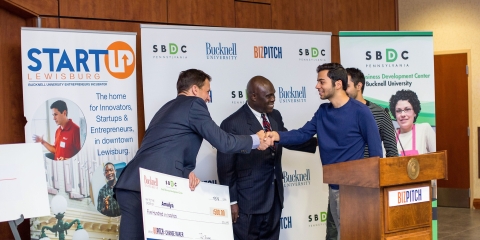 A BitPitch winner getting their check