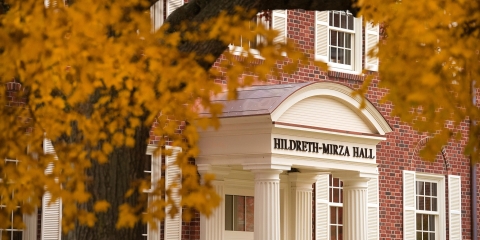 A fall picture of Hildreth-Mirza Hall's entrance