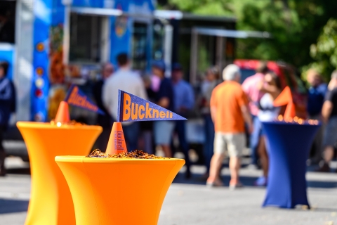 Food trucks and tables with Bucknell Pendants