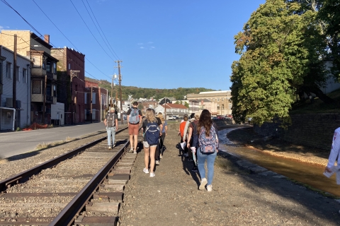 Students walk along Shamokin Creek