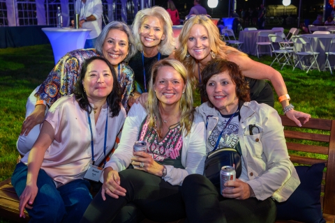 Ladies sitting on a bench at the Bison Blast