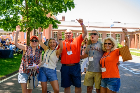 ALumni cheering in front of the KLARC building