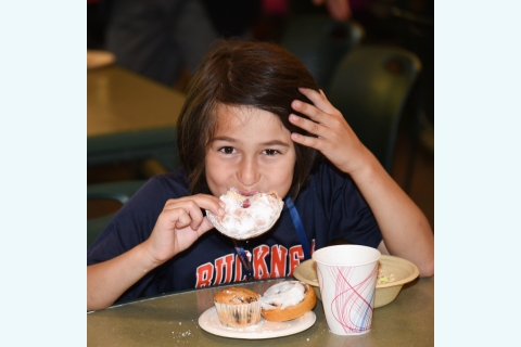 Child eating breakfast in Bostwick