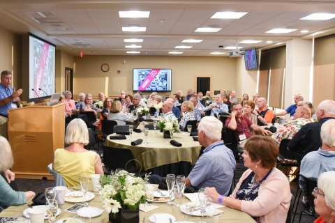 Joe Fama &#039;71 presenting to his class during their class dinner.