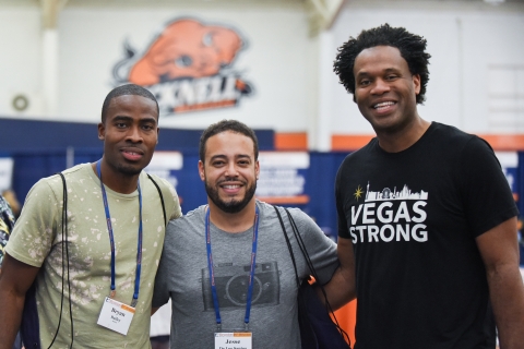 Roger Perry-Stovall &#039;02, Reunion Class Volunteer (far right) and friends checking-in for the weekend.