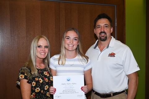 New inductee and parents at the GenFirst Tri-Alpha Induction Ceremony and Reception.