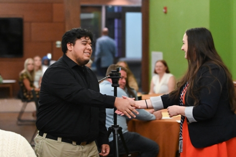 Awards ceremony at the GenFirst Tri-Alpha Induction Ceremony and Reception.