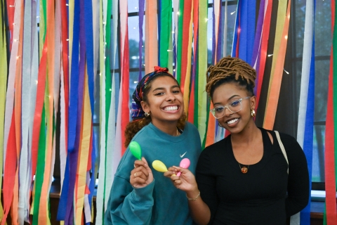 Current Bucknell students celebrating during Feria Latina, a Latine-style street fair, hosted by the Latine Alliance for Community and Opportunity for Students Club.