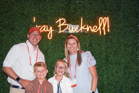 Scott Wasilko '08 and Sarah Surgala Wasilko '09 pose with their children.