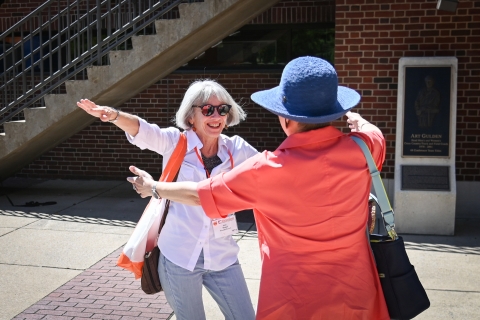 Two women about to hug