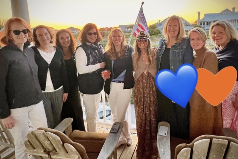 a group of Bucknell alums stand and smile together