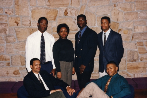 A group of Black students, all members of the National Society of Black Engineers, pose for a photo.