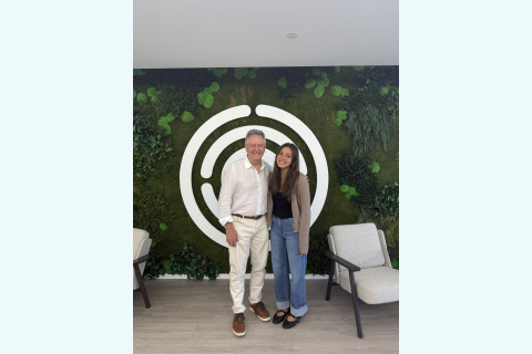 Mia Mezger stands next to Ken Cook 