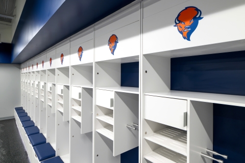 The men's lacross locker room feature white lockers with the Bucknell Bison logo 