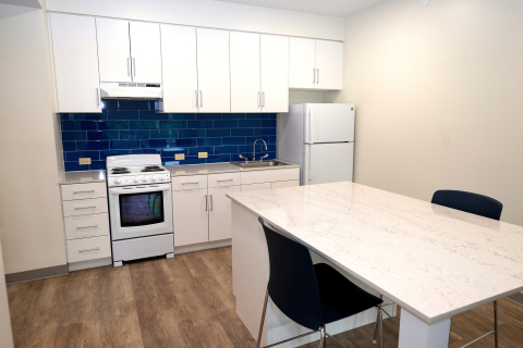 West Apartment kitchen, featuring a multifunctional island