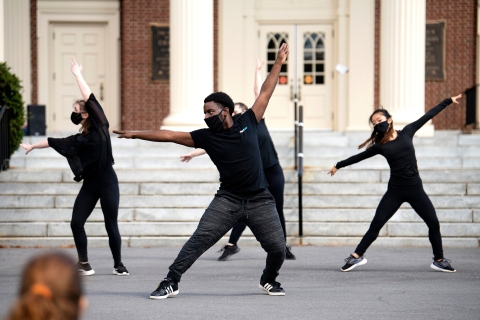 Dancers perform outside Rooke Chapel