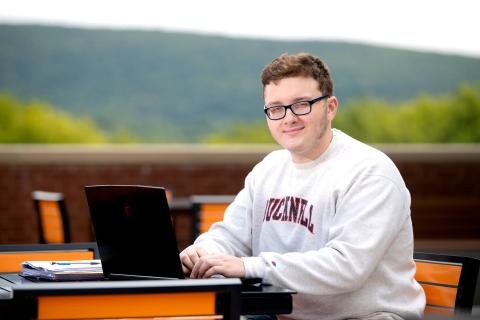 Will Horan on Academic East&#039;s second-floor patio