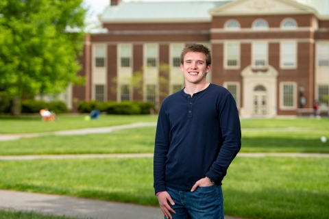 Cole Reish stands on the Quad