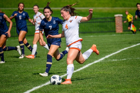 Team playing soccer.