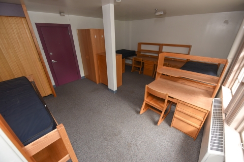Empty triple dorm room