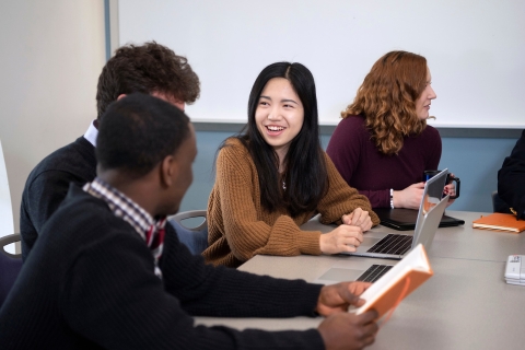 Students reviewing research