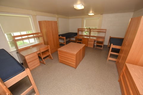 A three bed, vacant dorm room