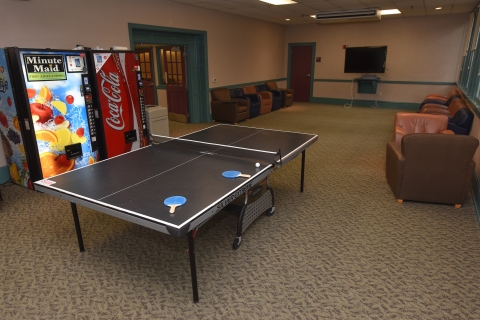 Recreation room in residence hall with ping pong table