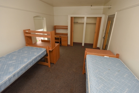 A vacant two student dorm room