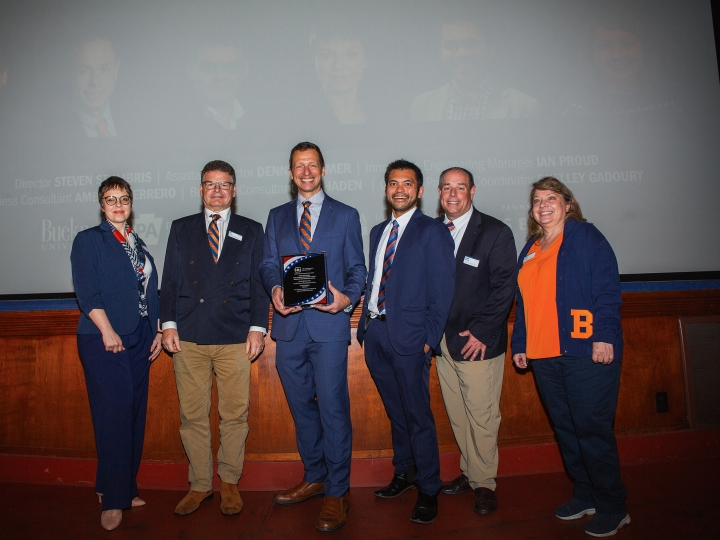 Members of the Bucknell SBDC staff with their award