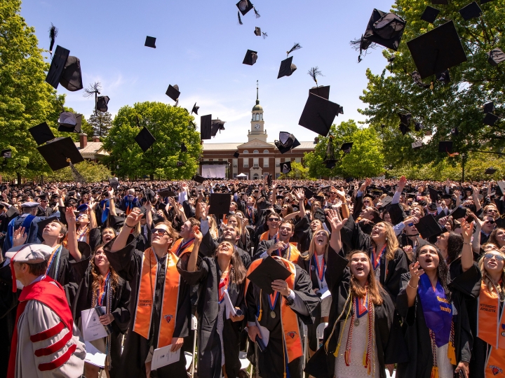 Hundreds of graduates on Malesardi Quadrangle throw their caps to celebrate their commencement