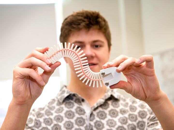 Caiden Covell &#039;25 bends the spine of his robot