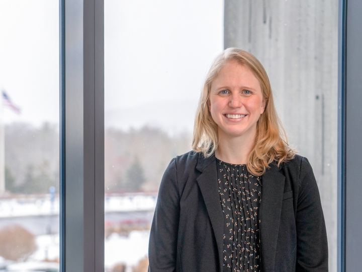 Laura Cook stands in front of a window at the Corning Museum of Glass
