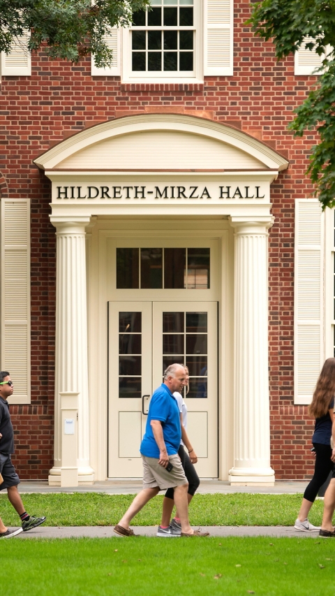 Tour walking outside of Hildreth-Mirza Hall