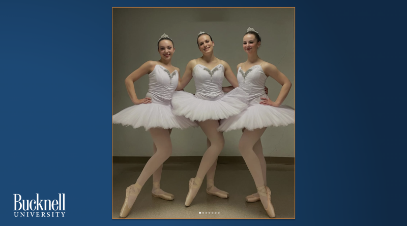 Three female students in white ballerina costumes