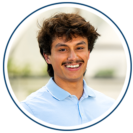 A circular portrait of student Allan Alas