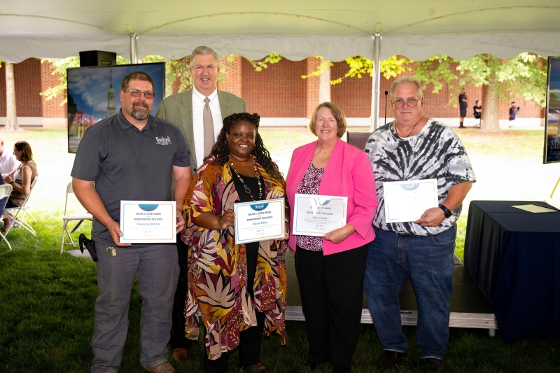 Award winners pose with President John Bravman