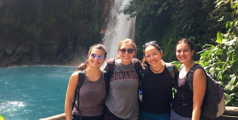 Students near waterfall in Costa Rica