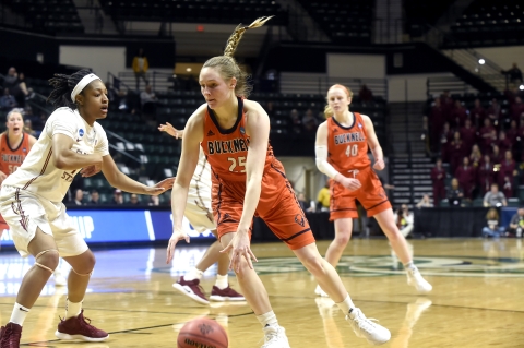 Abby Kapp dribbles past a defender