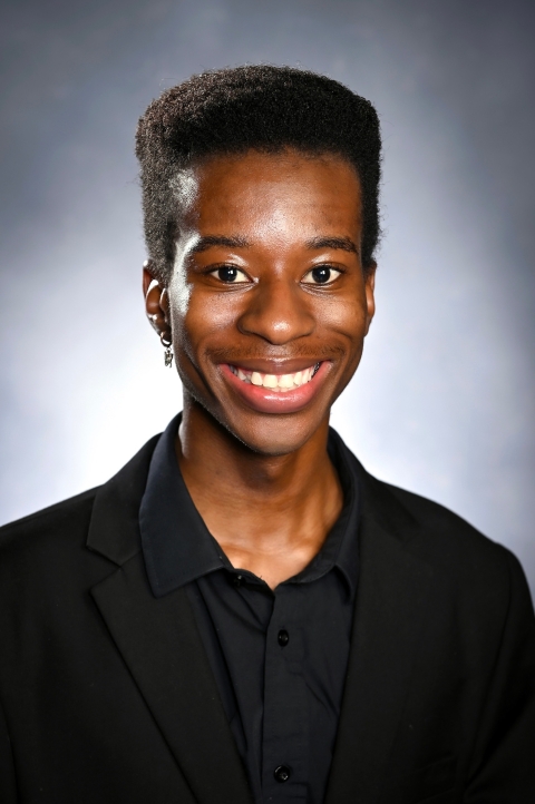 Thankdeka Bango smiles in a headshot