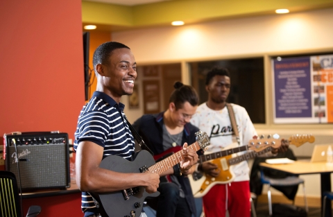 Hamza Shittu in guitar club